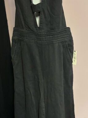 Anthropologie black jumpsuit with wide legs